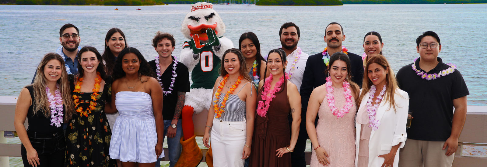 Students gathered with Sebastian the Ibis at Graduation Reception 2025