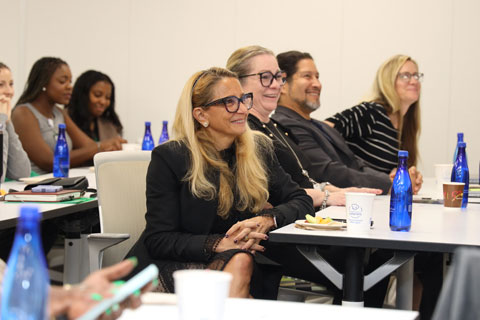 DPHS staff and faculty sitting together and smiling
