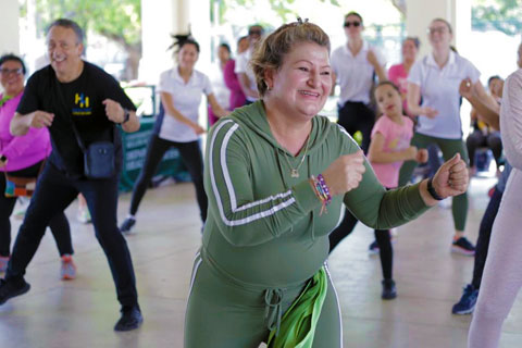 Group of people exercising and dancing