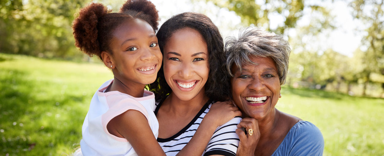 Family smiling and hugging