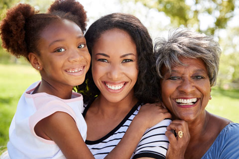 Family smiling and hugging