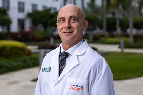 Portrait of Michele Ceccarelli with a garden outdoors background