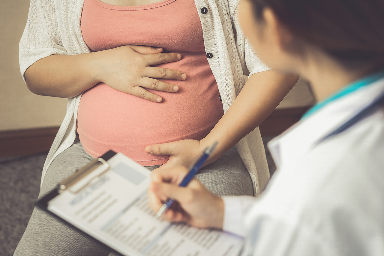 Pregnant Woman and Doctor Stock Picture.jpeg