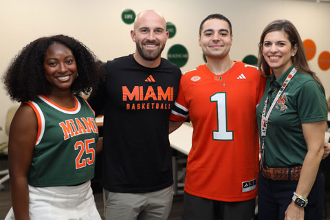 DPHS students and faculty wearing UM swag